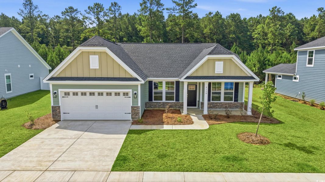 Front exterior of a new home in Westwood Reserve, Conway, SC, highlighting curb appeal (Image 1). Front exterior of a new home in Westwood Reserve, Conway, SC, highlighting curb appeal (Image 1).