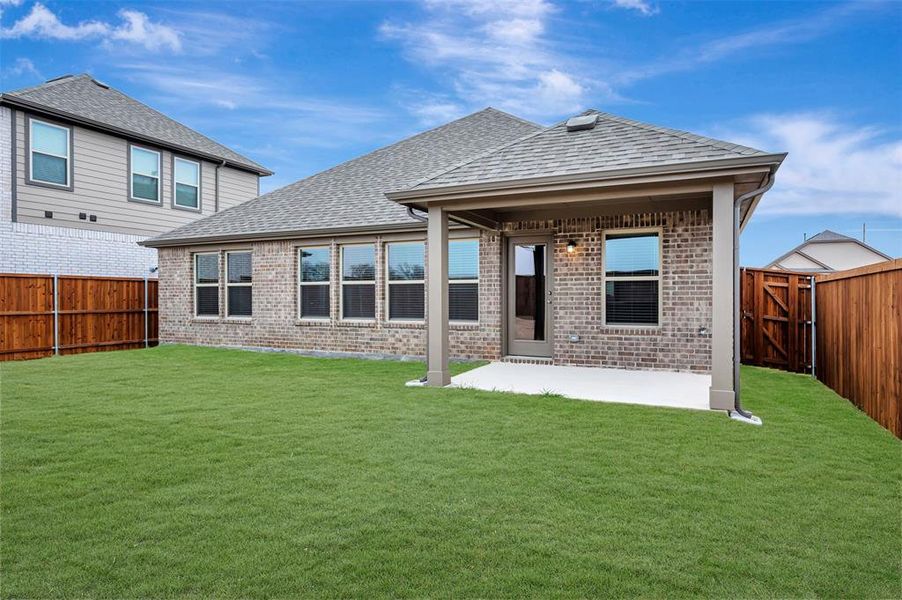 Exterior details and patio area of a home in The Preserve, Justin (Image 4). Exterior details and patio area of a home in The Preserve, Justin (Image 4).