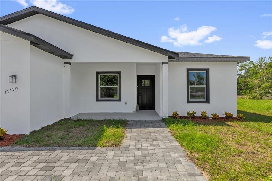 Exterior details and patio area of a home in , Ocala (Image 3).