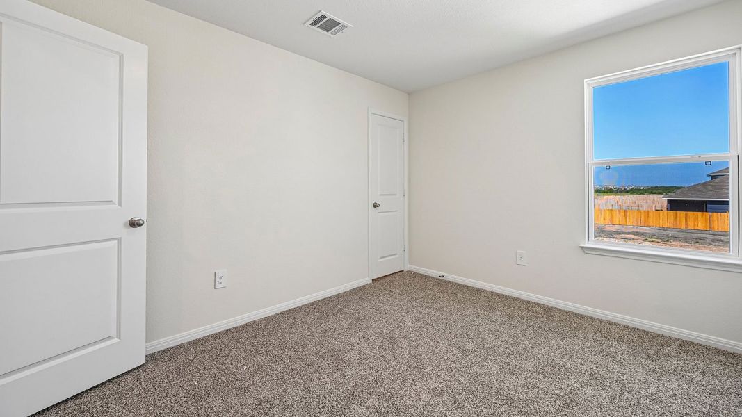 Spacious, unfurnished interior of a new home in Carillon, Manor (Image 38).
