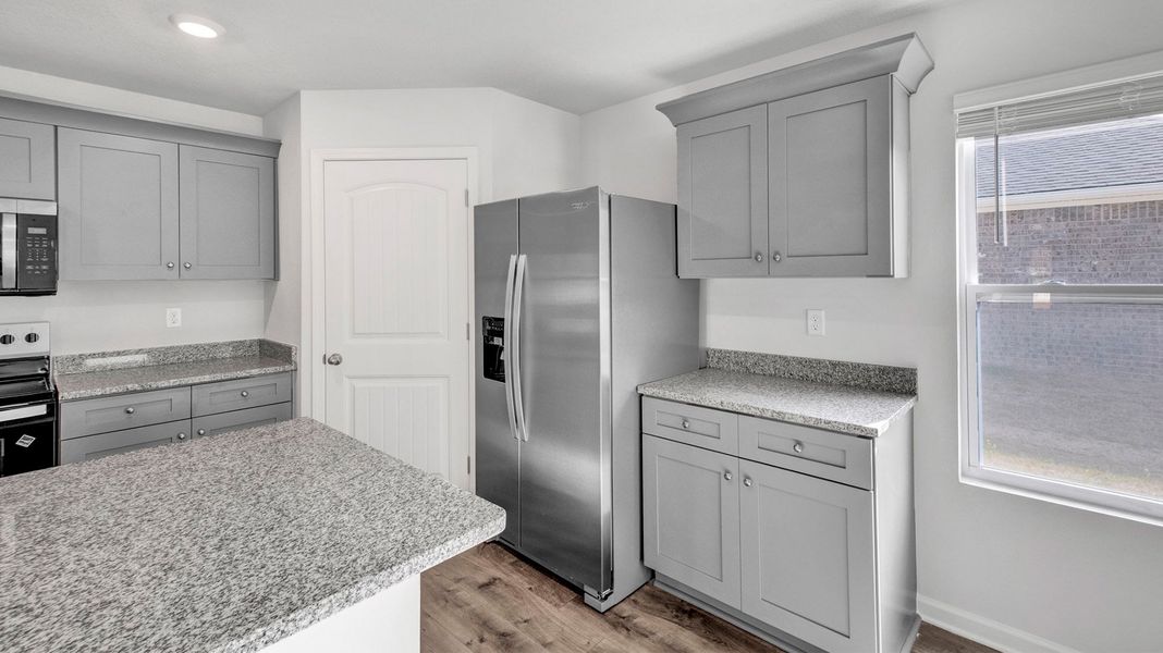 Furnished interior view inside a new home in Huntington Estates, Millington (Image 10).