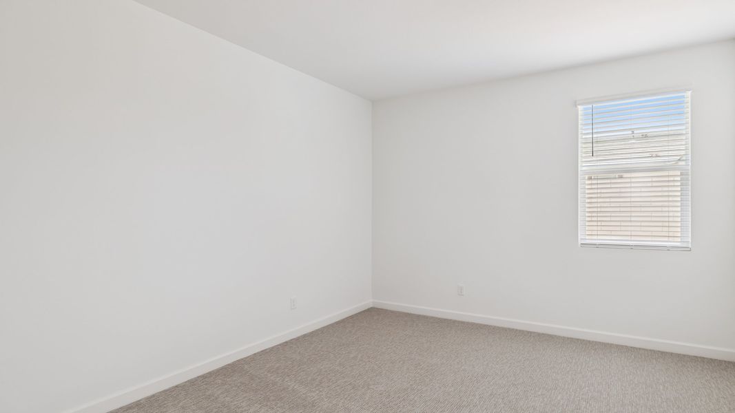 Spacious, unfurnished interior of a new home in Zanjero Pass, Waddell (Image 40).