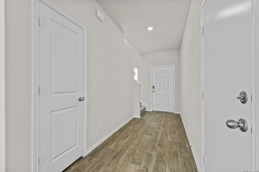 Spacious, unfurnished interior of a new home in Hunters Ranch, San Antonio (Image 32).