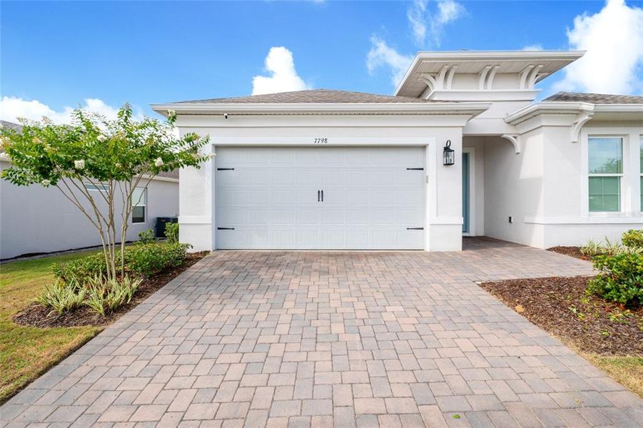 Front exterior of a new home in , Kissimmee, FL, highlighting curb appeal (Image 28). Front exterior of a new home in , Kissimmee, FL, highlighting curb appeal (Image 28).