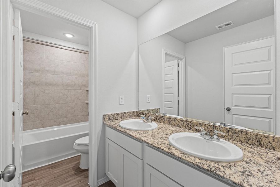 Furnished interior view inside a new home in Liberty Collection at Fairway Farms, Tomball (Image 8).