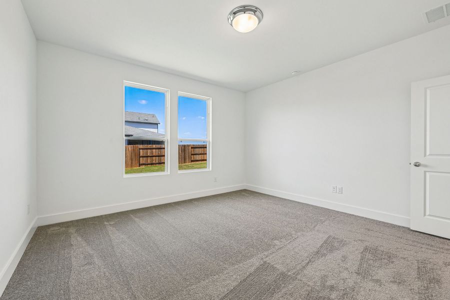 Spacious, unfurnished interior of a new home in Freedom at Anthem, Kyle (Image 19).