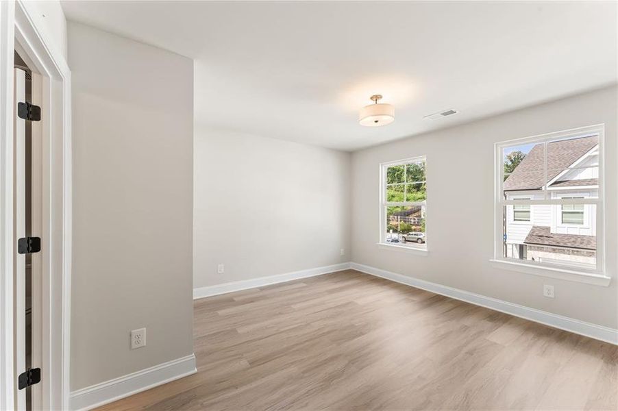 Spacious, unfurnished interior of a new home in The Village at Shallowford, Kennesaw (Image 16).
