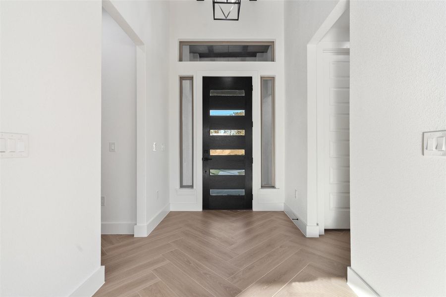 Entryway featuring baseboards