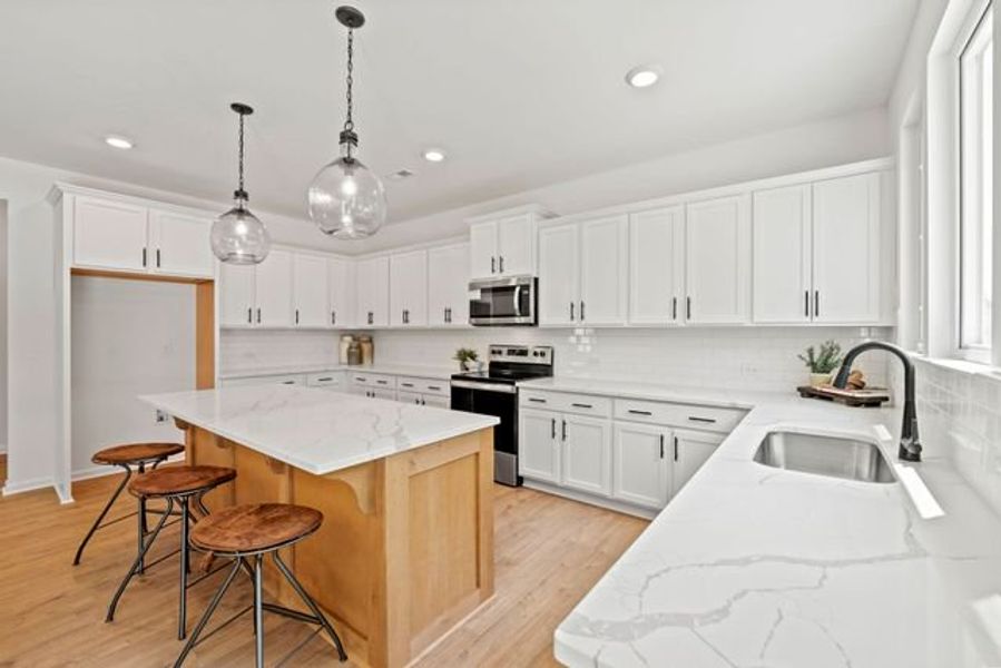 Representative furnished interior of a home built from the Hope by True Homes in Harpers Landing, Walkertown (Image 5).