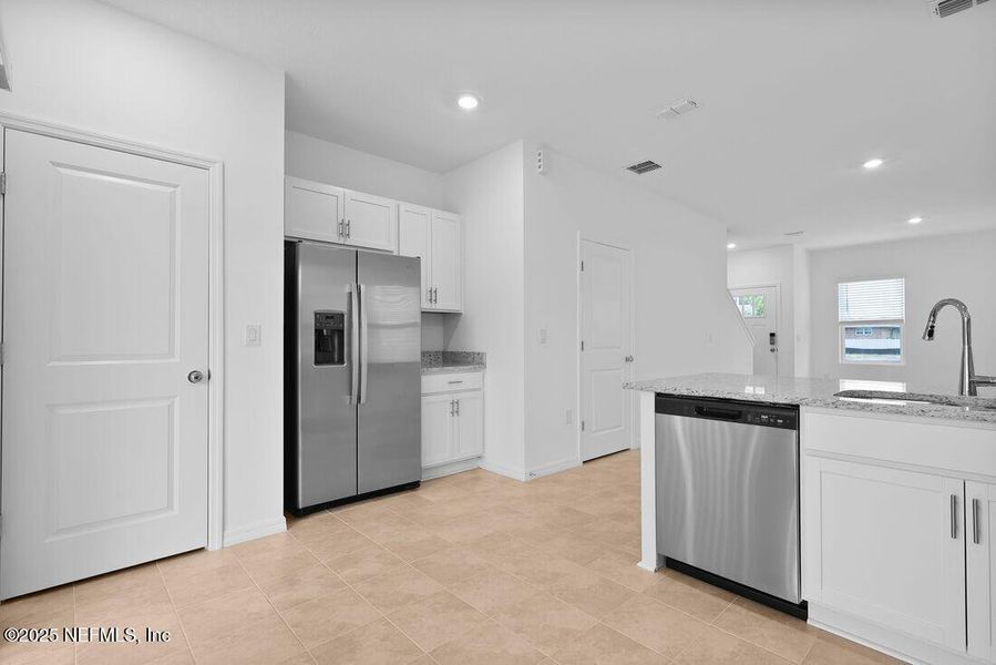 Furnished interior view inside a new home in Sabal Terrace, Jacksonville (Image 11).