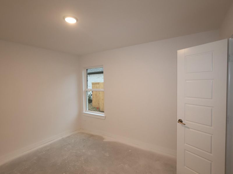 Spacious, unfurnished interior of a new home in Sorella, Tomball (Image 10).