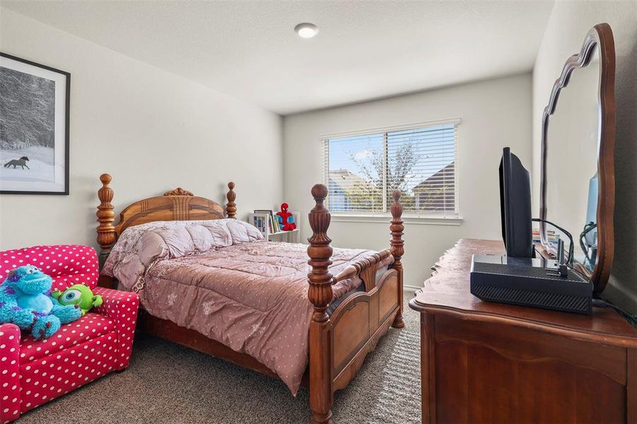 Bedroom featuring carpet floors