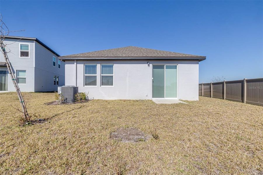 Exterior details and patio area of a home in The Grove at Stuart Crossing - Premier Series, Bartow (Image 4).