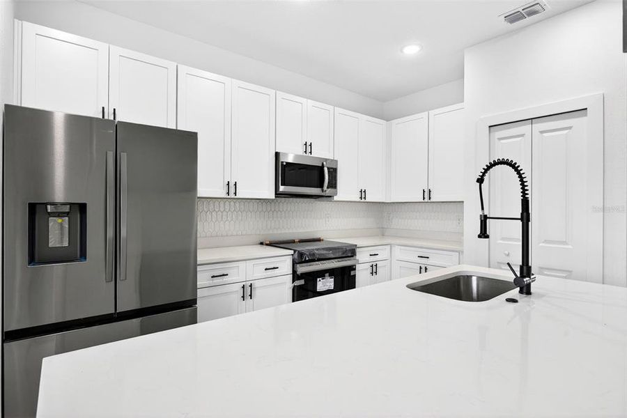 Furnished interior view inside a new home in , Port Charlotte (Image 14).