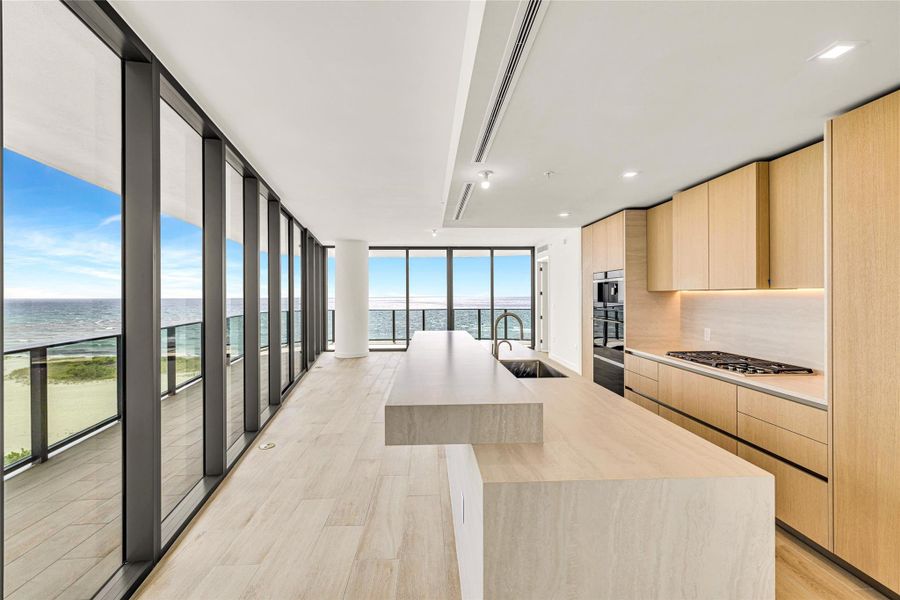 The Kitchen and Island is the Center of the Home - with Views!