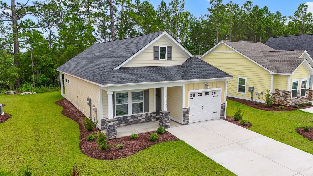 Front exterior of a new home in White Oak Estates, Conway, SC, highlighting curb appeal (Image 21).