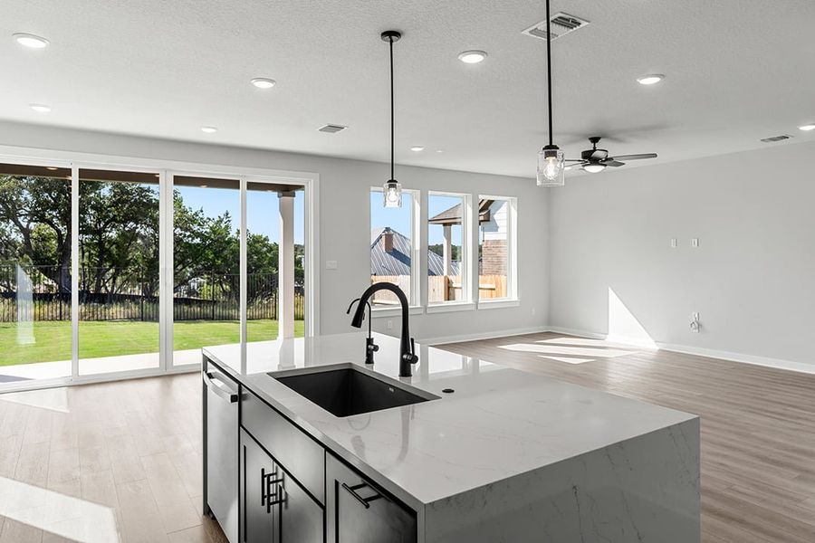 Furnished interior view inside a new home in Terrace Collection at Lariat, Liberty Hill (Image 12). Furnished interior view inside a new home in Terrace Collection at Lariat, Liberty Hill (Image 12).