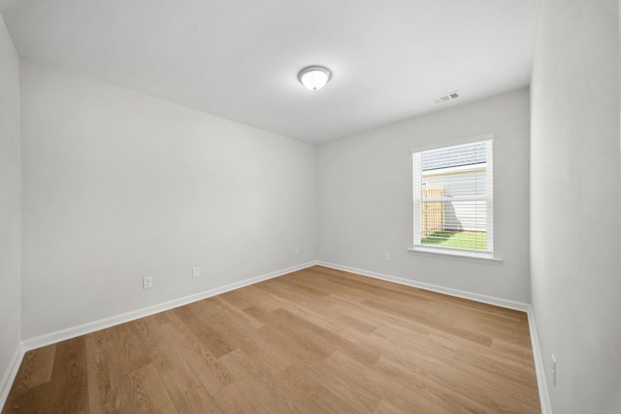 Representative unfurnished interior of a home built from the The Holly by Smith Family Homes in Belair East, Statesboro (Image 23).