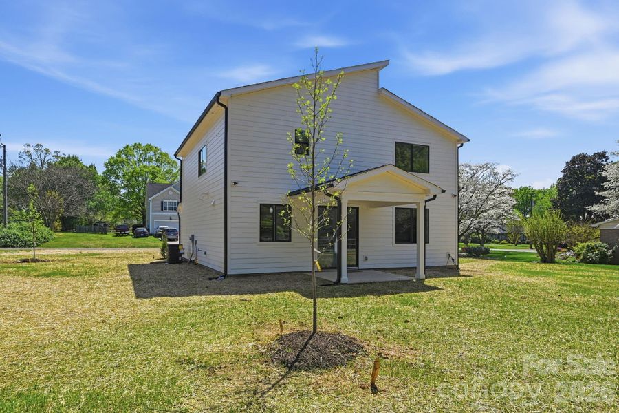 Exterior details and patio area of a home in , Huntersville (Image 25).
