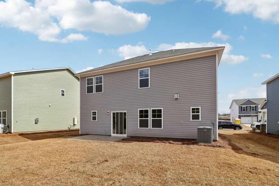 Representative exterior photo of a completed home built from the Porter II by Great Southern Homes in Cottages at Roofs Pond, West Columbia, SC (Image 37).