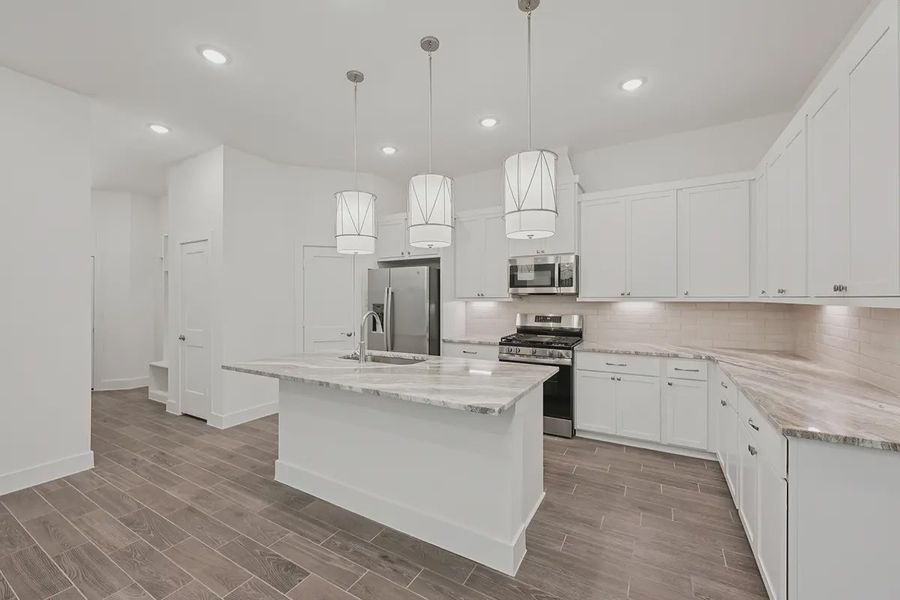 Representative furnished interior of a home built from the Pommery by Chesmar Homes in Kresston Chateau, Montgomery (Image 6). Representative furnished interior of a home built from the Pommery by Chesmar Homes in Kresston Chateau, Montgomery (Image 6).
