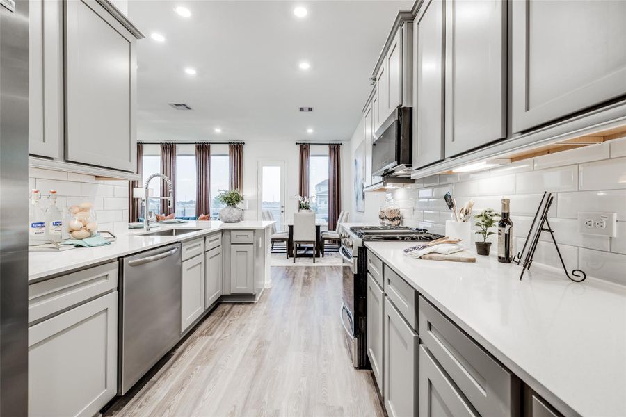 Furnished interior view inside a new home in Bridgeland, Cypress (Image 11).