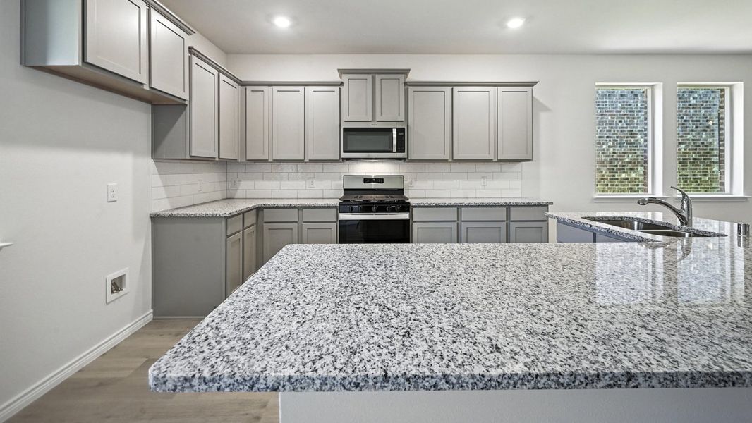 Furnished interior view inside a new home in The Woods at Lindsey Place, Anna (Image 3). Furnished interior view inside a new home in The Woods at Lindsey Place, Anna (Image 3).