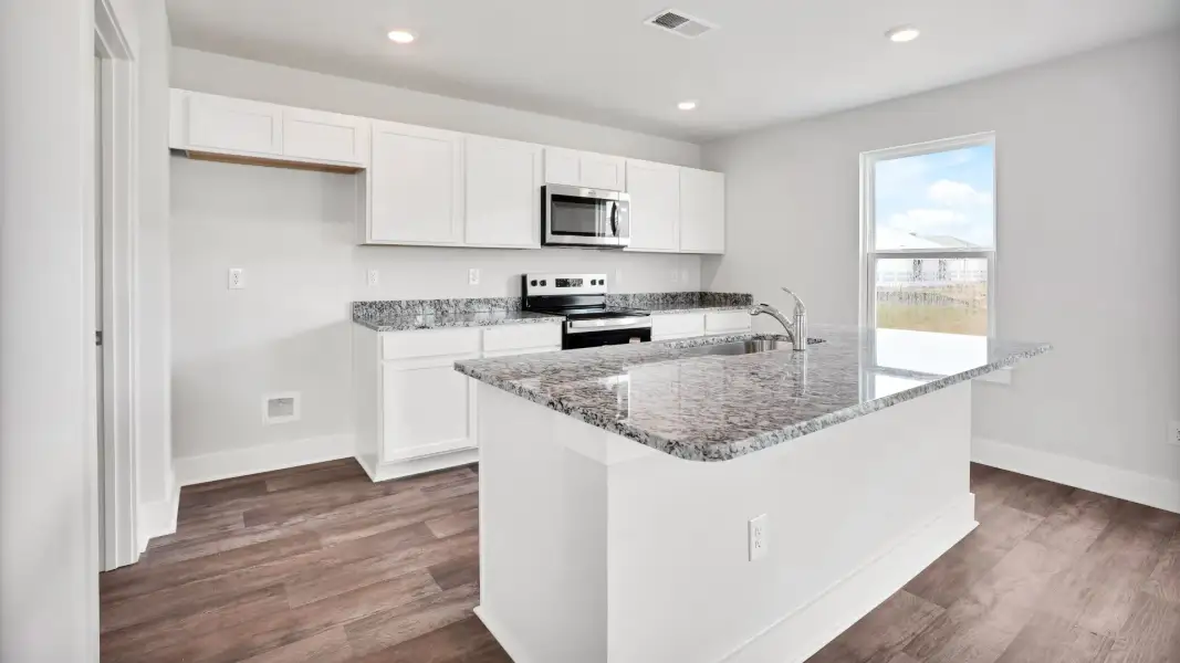 Furnished interior view inside a new home in Saltgrass Landing, Winnabow (Image 5).