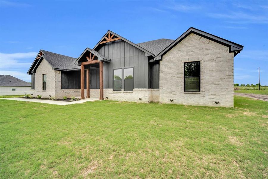 View of front of home with a front lawn