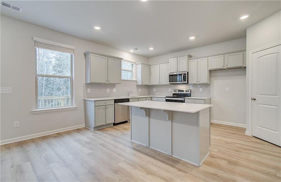 Furnished interior view inside a new home in Cedar Grove Commons, Conley (Image 5). Furnished interior view inside a new home in Cedar Grove Commons, Conley (Image 5).
