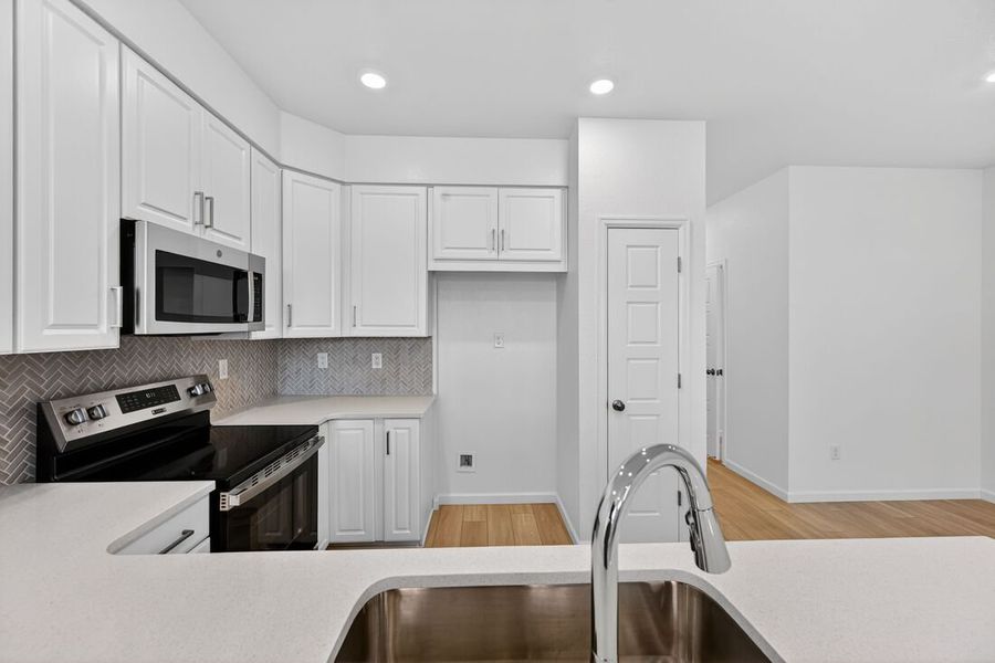 Furnished interior view inside a new home in Trailstone, Arvada (Image 4).