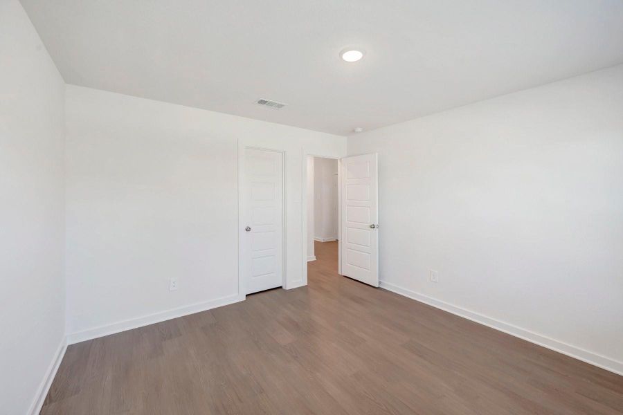 Spacious, unfurnished interior of a new home in Pinewood at Grand Texas, New Caney (Image 18). Spacious, unfurnished interior of a new home in Pinewood at Grand Texas, New Caney (Image 18).