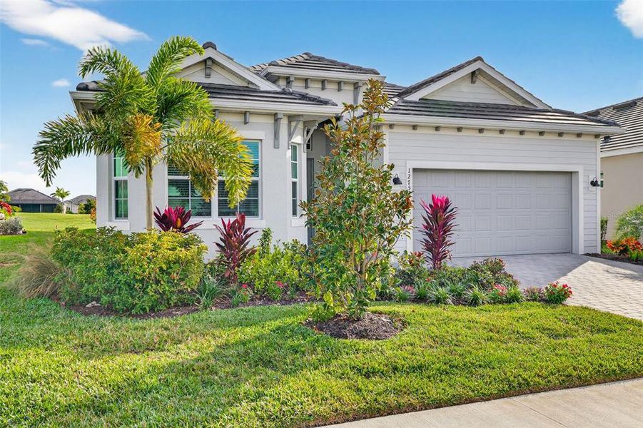 Front exterior of a new home in , Venice, FL, highlighting curb appeal (Image 22).