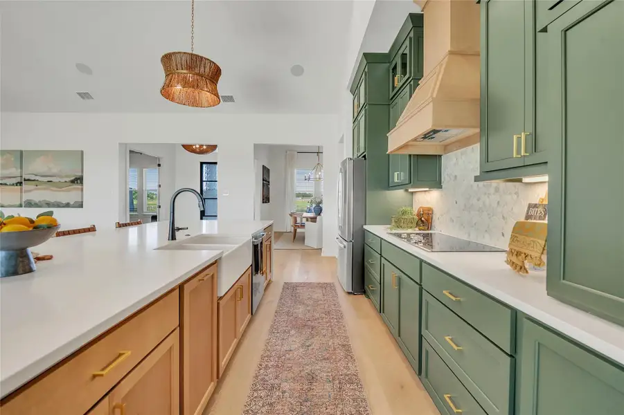 *Please note: These interior photos are not of the actual home but are from a previously completed home with a similar floor plan. Finishes, features, and layout may vary.