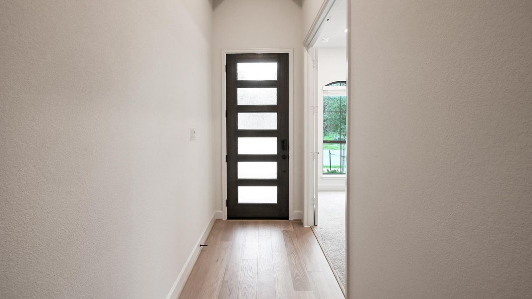 Spacious, unfurnished interior of a new home in 6 Creeks, Kyle (Image 16).
