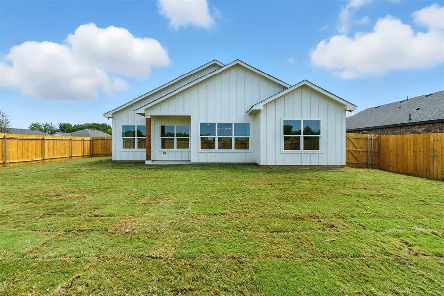 Front exterior of a new home in , Springtown, TX, highlighting curb appeal (Image 19).
