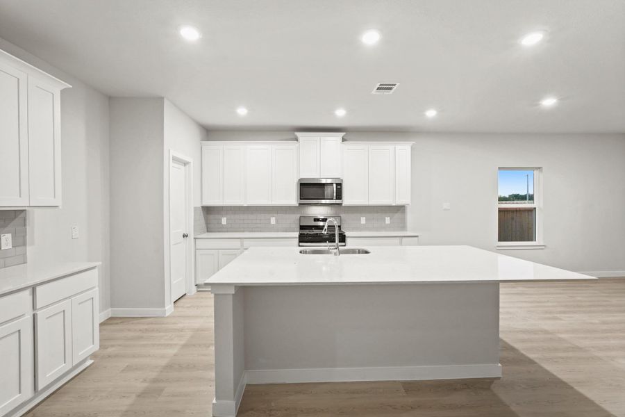 Furnished interior view inside a new home in Bayou Bend, Angleton (Image 7). Furnished interior view inside a new home in Bayou Bend, Angleton (Image 7).