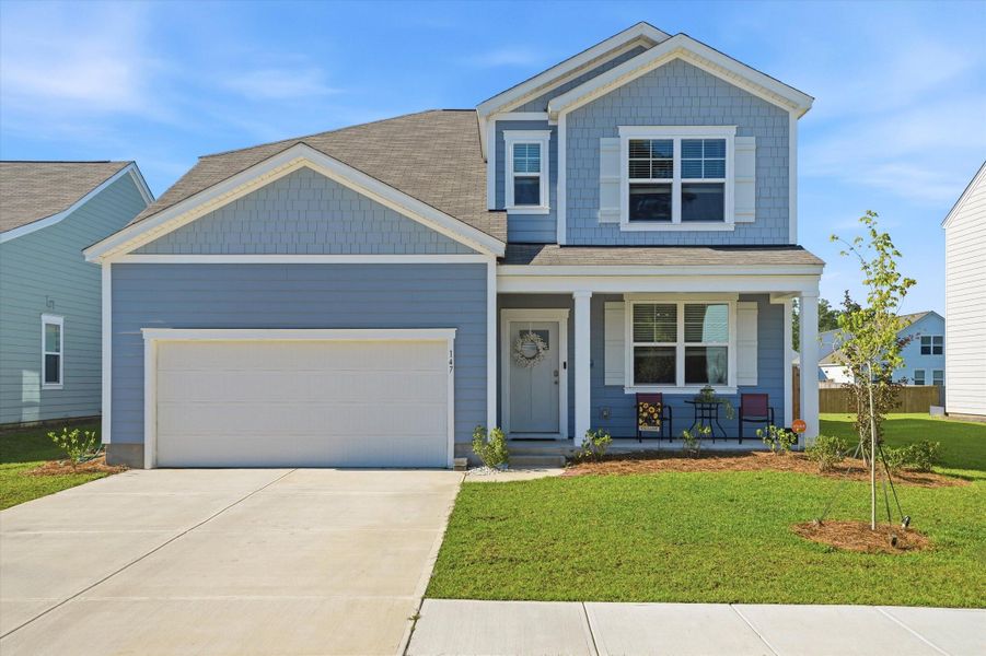 Front exterior of a new home in , Moncks Corner, SC, highlighting curb appeal (Image 27). Front exterior of a new home in , Moncks Corner, SC, highlighting curb appeal (Image 27).