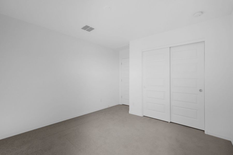 Spacious, unfurnished interior of a new home in Artisan at Asante, Surprise (Image 23).