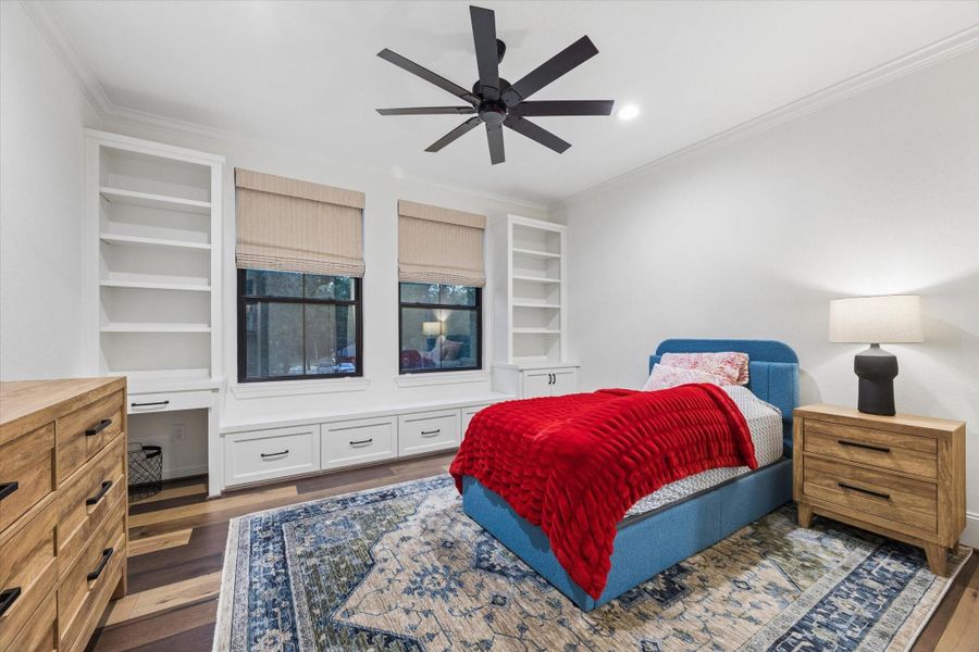 Bright, welcoming, and beautifully designed, this secondary suite combines generous proportions with custom built-ins to create a comfortable retreat that grows effortlessly with every stage of life.