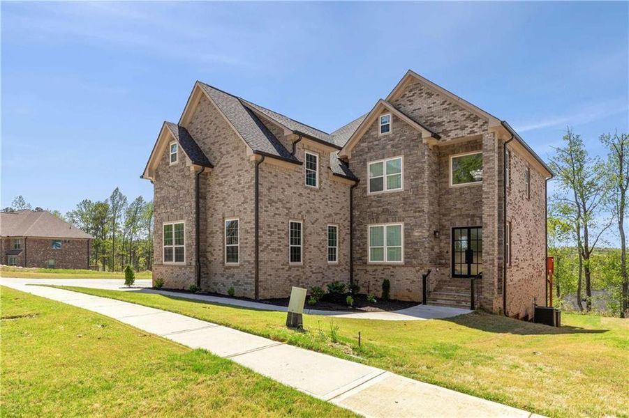 Front exterior of a new home in , Atlanta, GA, highlighting curb appeal (Image 25).
