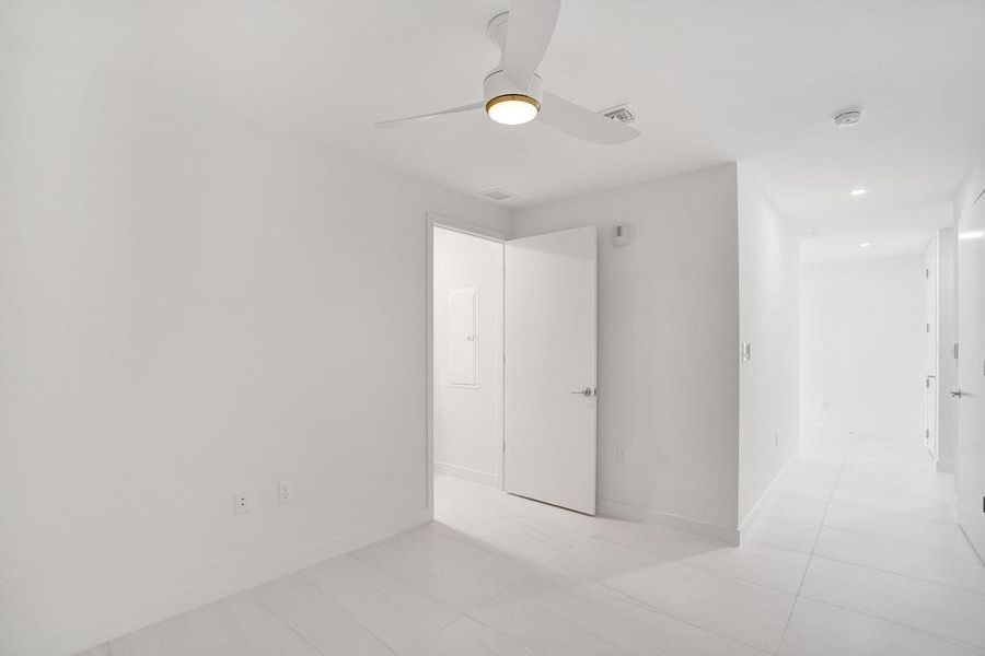 Spacious, unfurnished interior of a new home in Casamar, Pompano Beach (Image 26). Spacious, unfurnished interior of a new home in Casamar, Pompano Beach (Image 26).