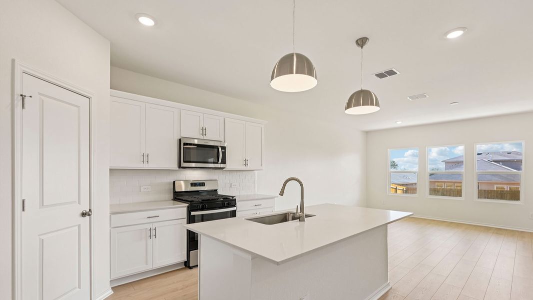 Furnished interior view inside a new home in Valverde, Bastrop (Image 6).