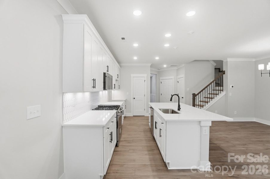 Furnished interior view inside a new home in Blythe Mill Townhomes, Waxhaw (Image 5).