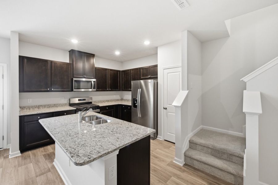 Furnished interior view inside a new home in Carpenter Falls, Durham (Image 14).