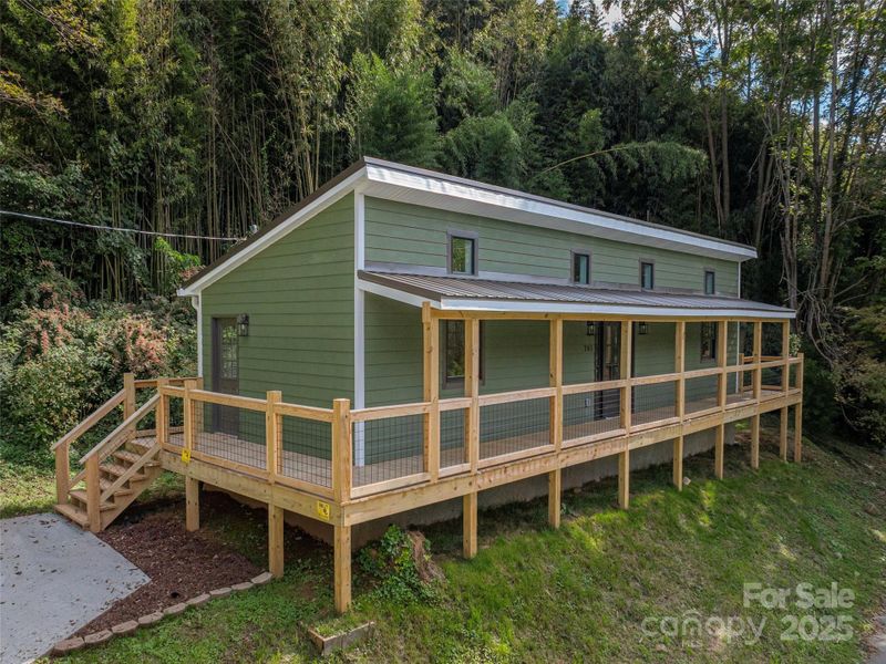 Front exterior of a new home in , Waynesville, NC, highlighting curb appeal (Image 18).