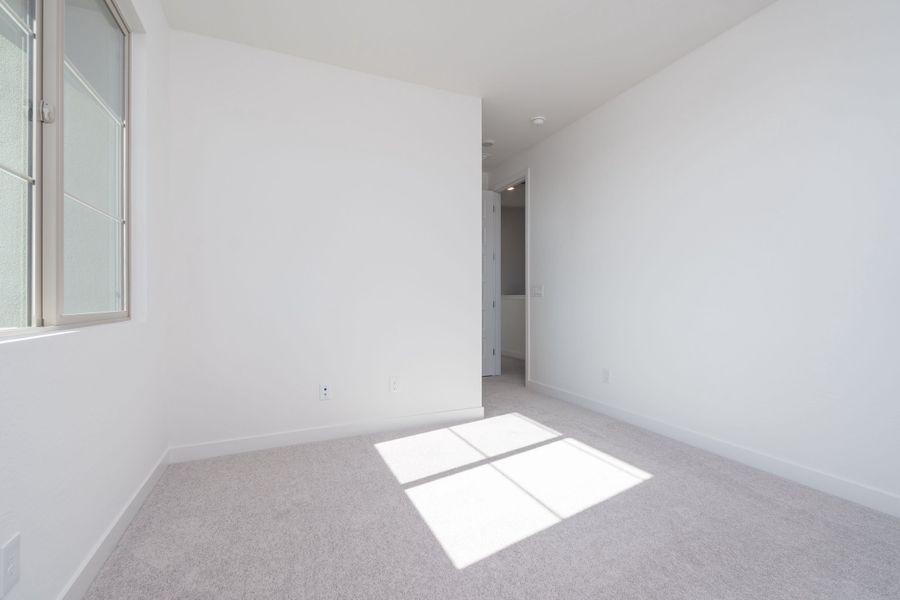 Spacious, unfurnished interior of a new home in Soleo, Queen Creek (Image 15).