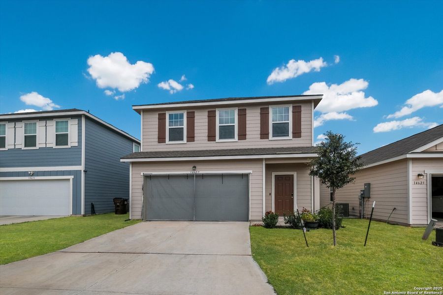 Front exterior of a new home in Trails at Culebra, San Antonio, TX, highlighting curb appeal (Image 21). Front exterior of a new home in Trails at Culebra, San Antonio, TX, highlighting curb appeal (Image 21).