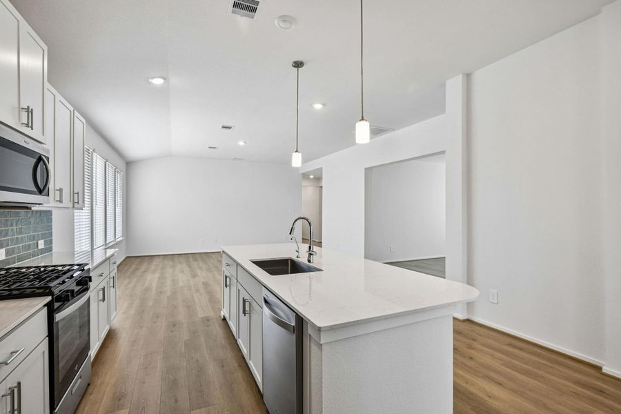 Furnished interior view inside a new home in Riviera Pines - Premier Series, Huffman (Image 9).