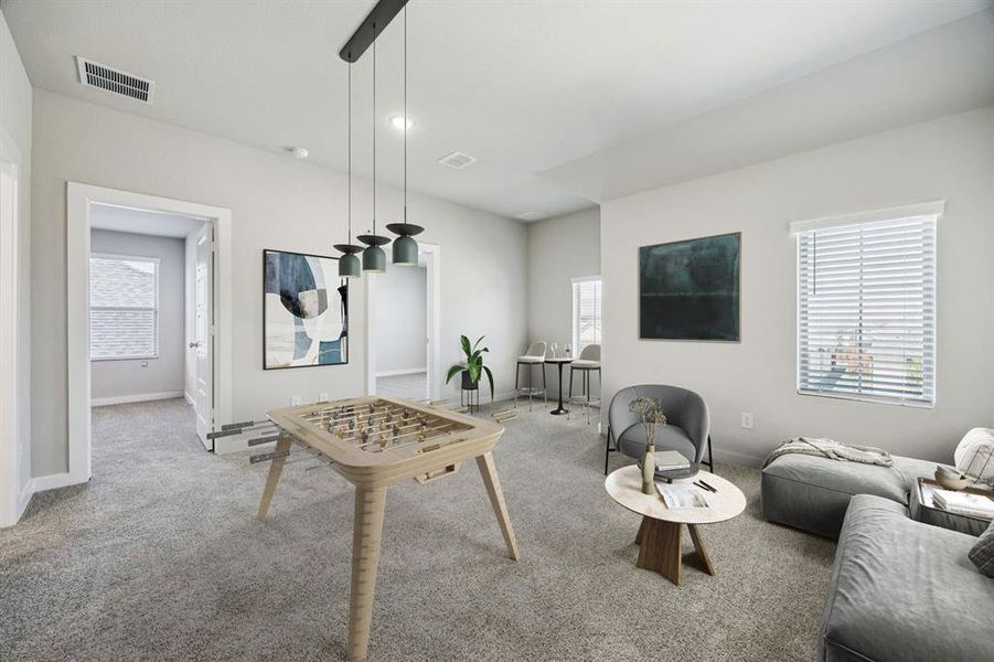 Game Room in the Holden home plan by Trophy Signature Homes – REPRESENTATIVE PHOTO